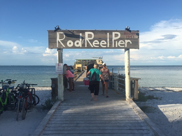 Experience the local feeling by eating at Rod and Reel Pier in Anna Maria City